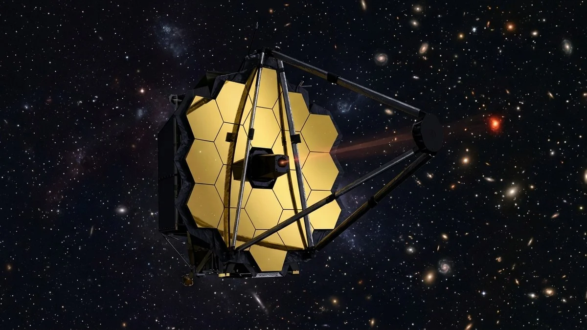 Illustration of JWST's NIRSpec instrument capturing infrared light from a distant red galaxy
