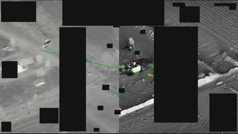 Redacted government mission report document.