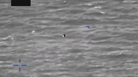 DOW-UAP-PR056, "Spherical UAP pulsing over water [CALLSIGN]"